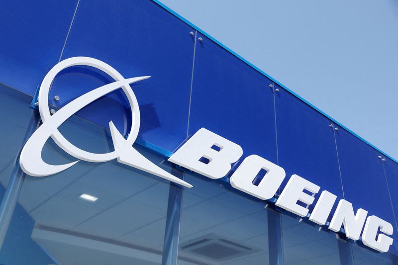 © Reuters. FILE PHOTO: Signage for Boeing is seen on a trade pavilion at the Farnborough International Airshow, in Farnborough, Britain, July 19, 2022. REUTERS/Matthew Childs/File Photo