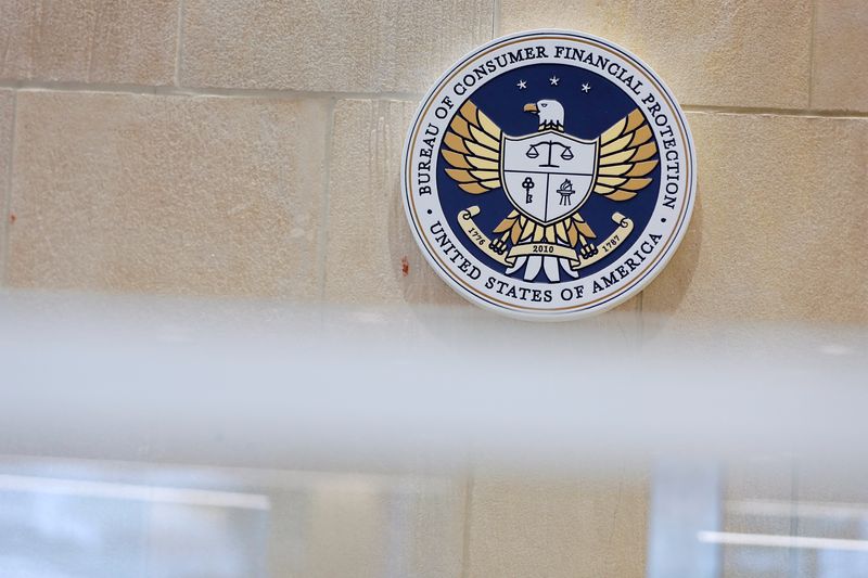 © Reuters. FILE PHOTO: The seal of the Consumer Financial Protection Bureau (CFPB) is seen at their headquarters in Washington, D.C., U.S., May 14, 2021. REUTERS/Andrew Kelly/File Photo