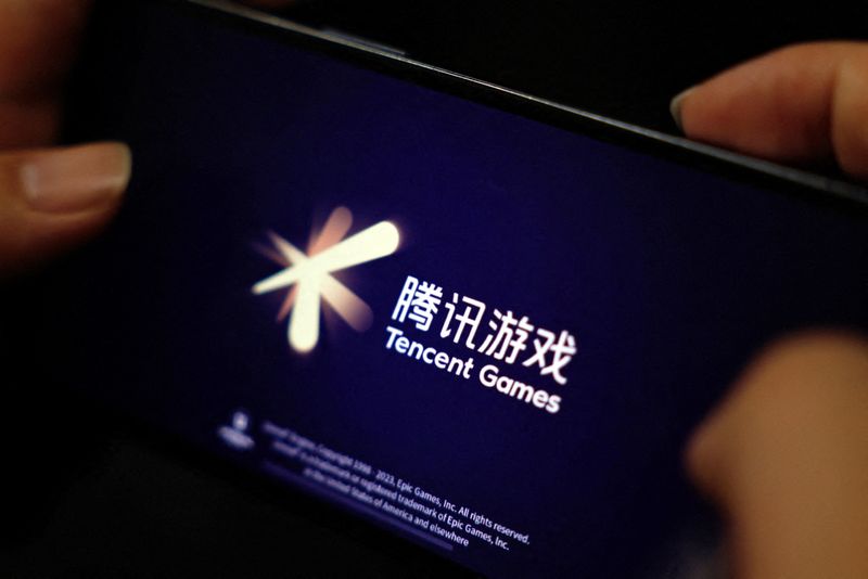 © Reuters. FILE PHOTO: The Tencent Games logo is seen on its game on a mobile phone in this illustration picture taken March 19, 2024. REUTERS/Tingshu Wang/Illustration/File Photo