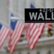 © Reuters. FILE PHOTO: A street sign for Wall Street is seen outside the New York Stock Exchange (NYSE) in Manhattan, New York City, U.S. December 28, 2016. REUTERS/Andrew Kelly/File Photo