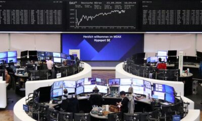 © Reuters. FILE PHOTO: The German share price index DAX graph is pictured at the stock exchange in Frankfurt, Germany, September 23, 2024. REUTERS/Staff/File photo