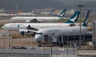 © Reuters. FILE PHOTO: A Cathay Pacific Airbus A350 aircraft is seen in Hong Kong International Airport, in Hong Kong, China September 3, 2024. REUTERS/Tyrone Siu/File Photo