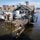 © Reuters. A drone view of a damaged business around Cedar Key Fishing Pier following Hurricane Helene in Cedar Key, Florida, U.S., September 28, 2024.  REUTERS/Marco Bello/File Photo