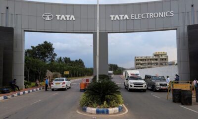 © Reuters. FILE PHOTO: Vehicles pass through the security check at the entrance of a Tata Electronics plant which makes Apple iPhone components in Hosur, Tamil Nadu, India, Sept. 28, 2024. REUTERS/Haripriya Suresh/File Photo