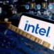 © Reuters. FILE PHOTO: A smartphone with a displayed Intel logo is placed on a computer motherboard in this illustration taken March 6, 2023. REUTERS/Dado Ruvic/Illustration/File Photo