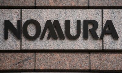 © Reuters. FILE PHOTO: A Nomura logo is pictured at their office in the Manhattan borough of New York City, New York, U.S. June 23, 2017.   REUTERS/Carlo Allegri/File photo