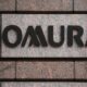 © Reuters. FILE PHOTO: A Nomura logo is pictured at their office in the Manhattan borough of New York City, New York, U.S. June 23, 2017.   REUTERS/Carlo Allegri/File photo