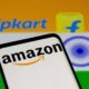 © Reuters. FILE PHOTO: Smartphone with Amazon logo is seen in front of displayed Flipkart logo and Indian flag in this illustration taken, July 30, 2021. REUTERS/Dado Ruvic/Illustration/File Photo