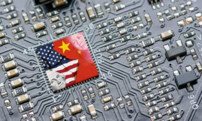 A circuit board with symbols of China and the U.S.