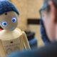 © Reuters. FILE PHOTO: A visitor talks with the Navel robot, by Navel Robotics, during the AI for Good Global summit on artificial intelligence, organised by the International Telecommunication Union (ITU), in Geneva, Switzerland, May 30, 2024. REUTERS/Denis Balibouse/File photo