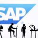 © Reuters. FILE PHOTO: Figurines with computers and smartphones are seen in front of SAP logo in this illustration taken, February 19, 2024. REUTERS/Dado Ruvic/Illustration/File Photo