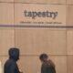 © Reuters. FILE PHOTO: A signage is seen in the offices of Tapestry, Inc., in Manhattan, New York, U.S., November 19, 2021. REUTERS/Andrew Kelly/File Photo